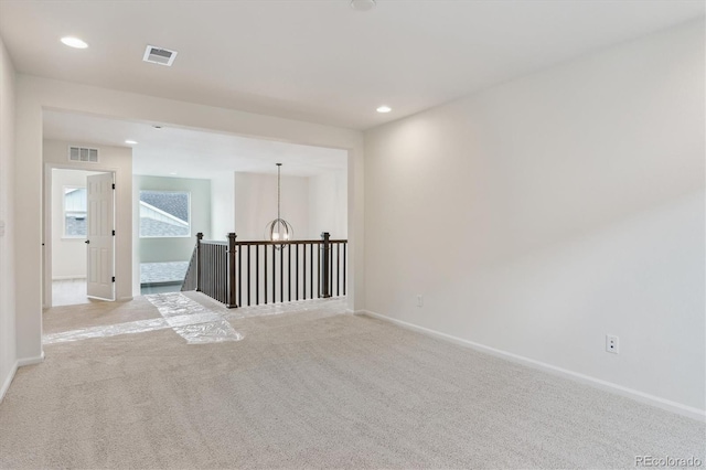 8205 Cokedale Cir, Littleton, CO 80125 - spare room featuring a chandelier, carpet floors, baseboards, and recessed lighting