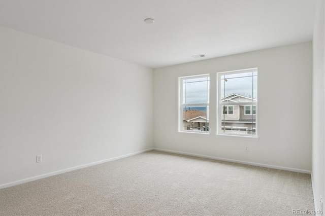 8205 Cokedale Cir, Littleton, CO 80125 - empty room featuring light colored carpet and baseboards