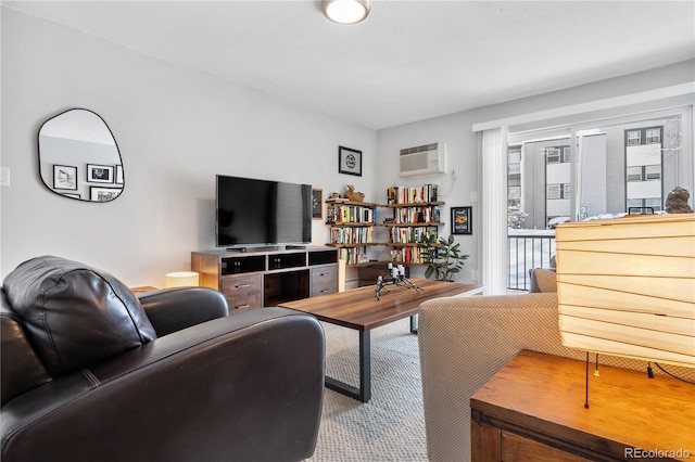 living room with a wall mounted AC