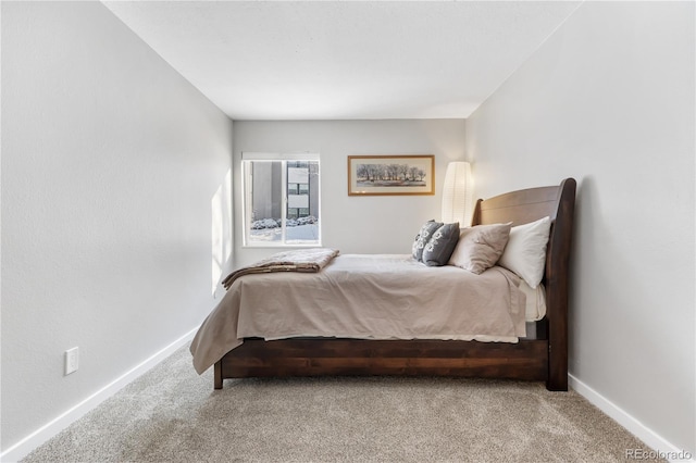 bedroom with light carpet