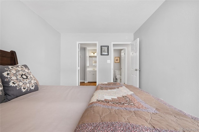 bedroom with connected bathroom