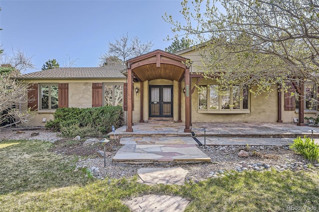 view of front of property with brick siding
