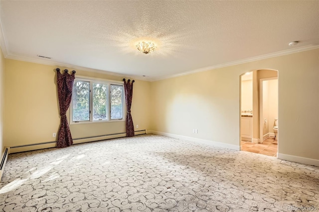 spare room with arched walkways, crown molding, a textured ceiling, and baseboards
