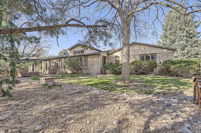 ranch-style home with brick siding