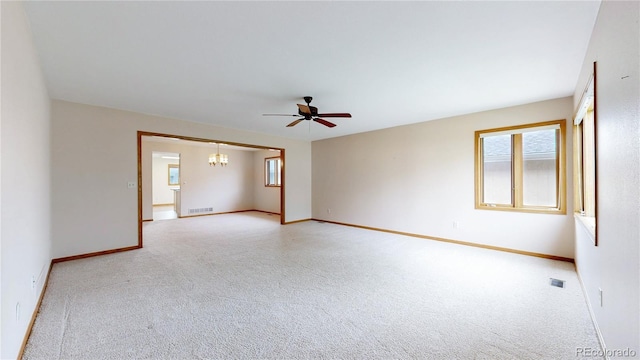 23 Carla Way, Broomfield, CO 80020 - carpeted empty room with a chandelier, a ceiling fan, and baseboards