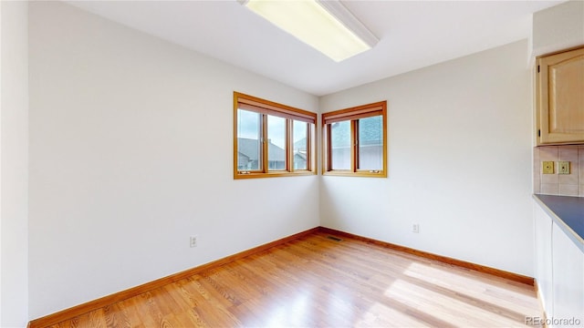 23 Carla Way, Broomfield, CO 80020 - unfurnished room with light wood-style floors and baseboards