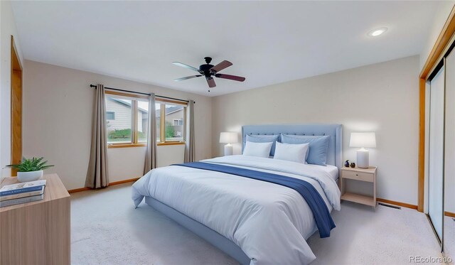 23 Carla Way, Broomfield, CO 80020 - bedroom featuring baseboards, light carpet, a closet, and ceiling fan
