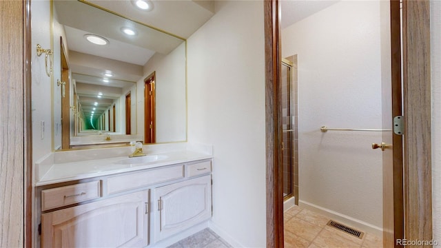23 Carla Way, Broomfield, CO 80020 - full bath with a shower stall, vanity, baseboards, and recessed lighting