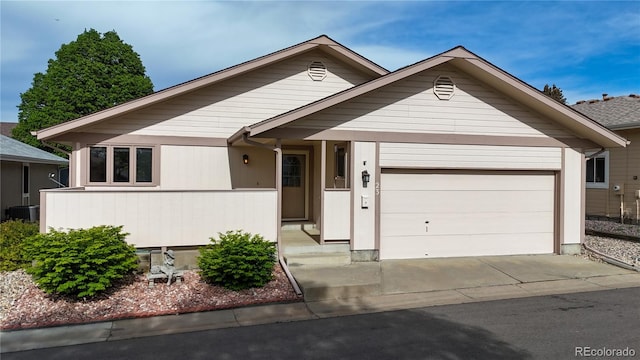 23 Carla Way, Broomfield, CO 80020 - ranch-style home featuring a garage, driveway, and central AC