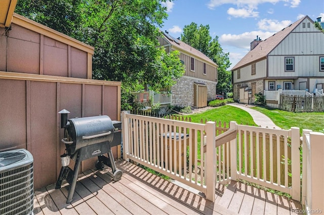 12059 E Hoye Dr, Aurora, CO 80012 - wooden terrace with a grill