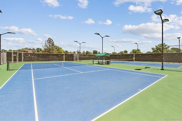12059 E Hoye Dr, Aurora, CO 80012 - view of tennis court featuring community basketball court