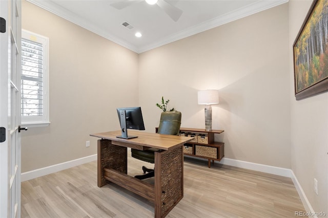 office space featuring ceiling fan, light wood-type flooring, and crown molding