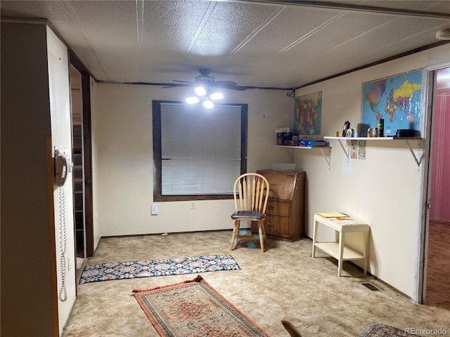 745 Cedar Ave, Cedaredge, CO 81413 - sitting room featuring carpet floors and a ceiling fan