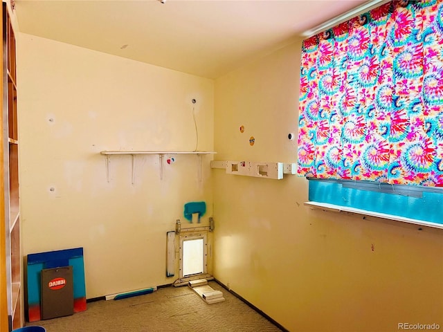 745 Cedar Ave, Cedaredge, CO 81413 - spare room featuring carpet floors and baseboards