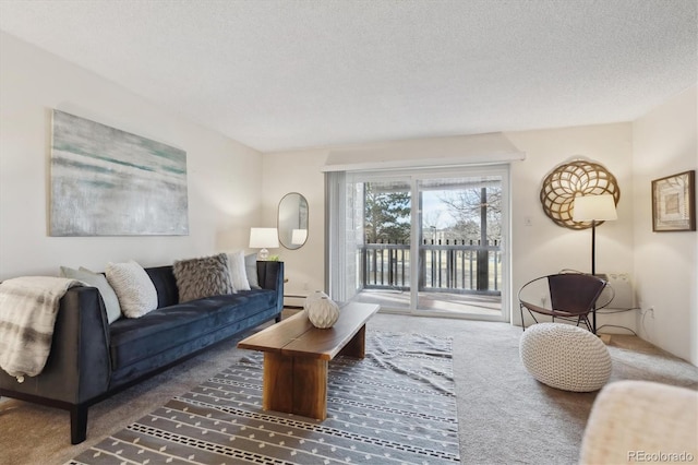 living room featuring a textured ceiling and dark colored carpet