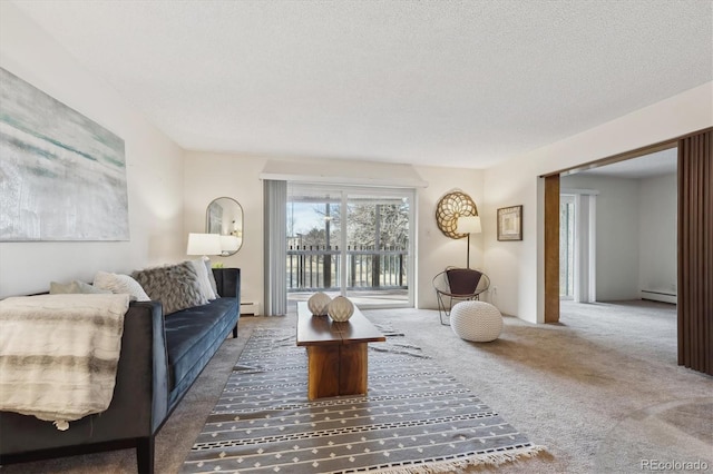 carpeted living room featuring a baseboard radiator and a textured ceiling