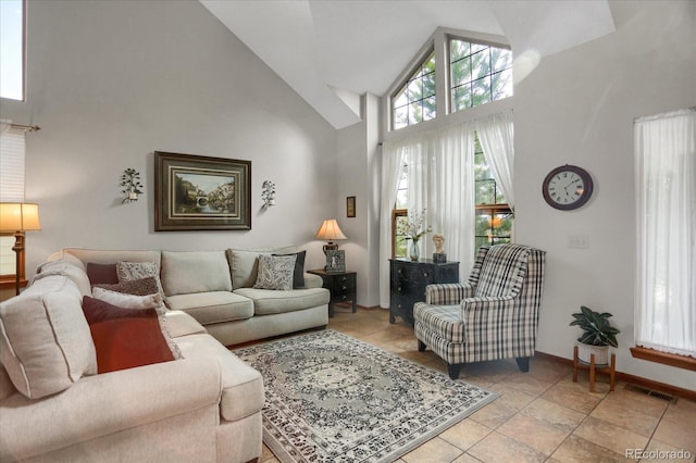 6112 Alkire Ct, Arvada, CO 80004 - living room with high vaulted ceiling and baseboards