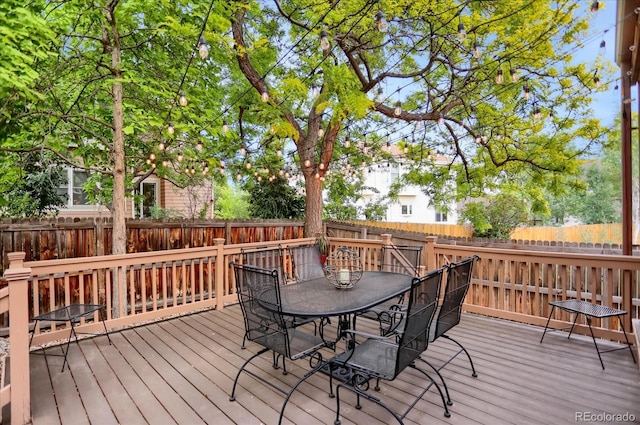 6112 Alkire Ct, Arvada, CO 80004 - wooden terrace featuring outdoor dining space