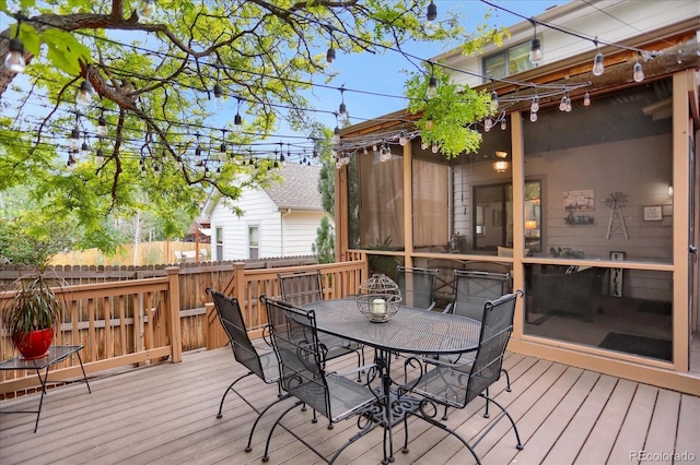 6112 Alkire Ct, Arvada, CO 80004 - wooden terrace with outdoor dining area