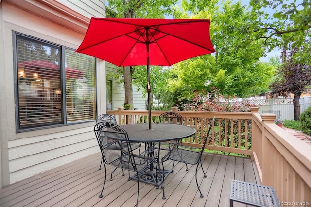 6112 Alkire Ct, Arvada, CO 80004 - wooden terrace with outdoor dining area