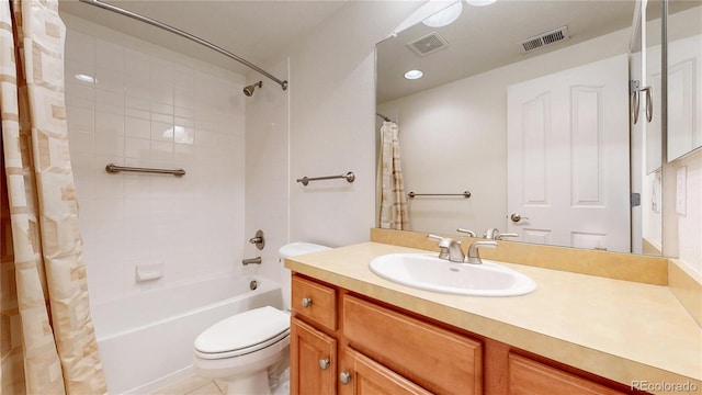 full bath featuring toilet, shower / bath combo, vanity, and visible vents