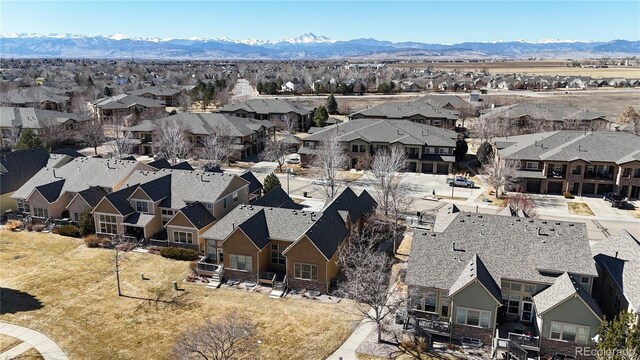 aerial view with a residential view and a mountain view