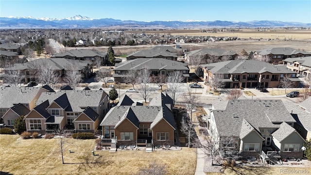 birds eye view of property featuring a residential view and a mountain view