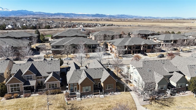 bird's eye view featuring a residential view and a mountain view