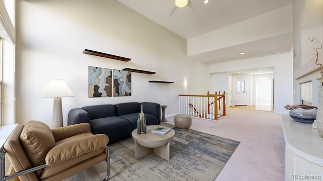 2238 Calais Dr Unit B, Longmont, CO 80504 - carpeted living room featuring baseboards, a ceiling fan, recessed lighting, and high vaulted ceiling