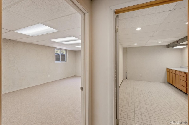 interior space featuring a paneled ceiling