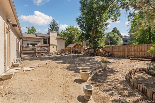 view of yard featuring a deck