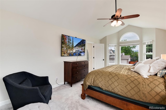 11056 W Rowland Ave, Littleton, CO 80127 - bedroom with light carpet, vaulted ceiling, baseboards, and a ceiling fan