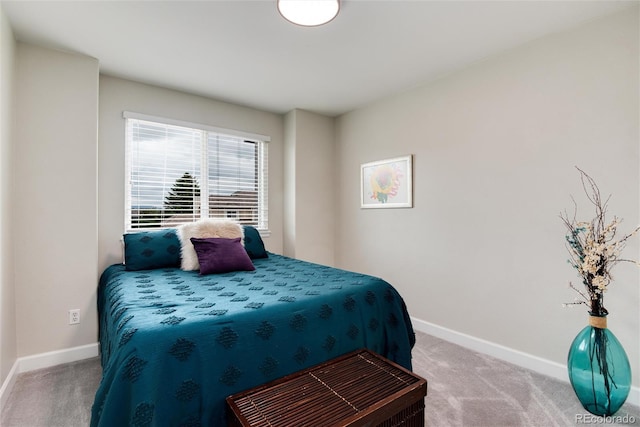 11056 W Rowland Ave, Littleton, CO 80127 - carpeted bedroom with baseboards