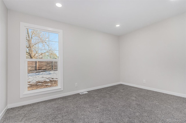 view of carpeted spare room