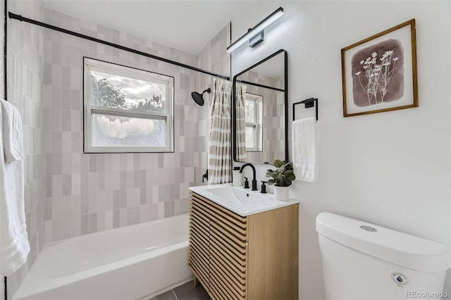 full bathroom featuring shower / bathtub combination with curtain, vanity, and toilet