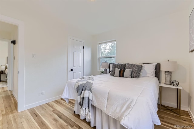 bedroom featuring light hardwood / wood-style floors