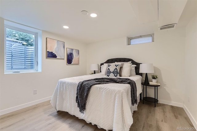 bedroom featuring light wood-type flooring