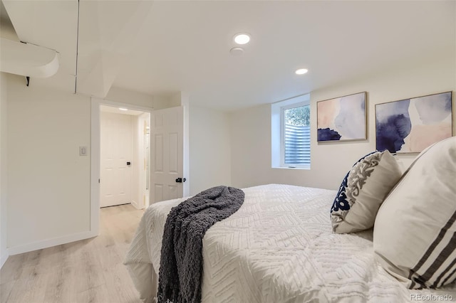 bedroom featuring light hardwood / wood-style floors