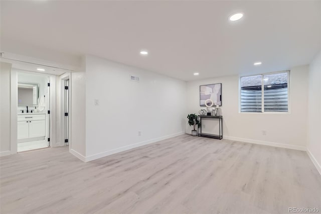 empty room with light wood-type flooring