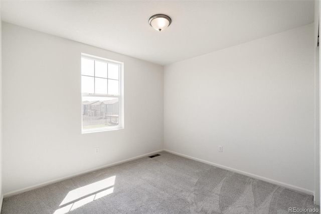 view of carpeted spare room