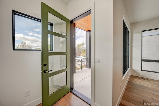 420 E Arkansas St, Buena Vista, CO 81211 - doorway to outside featuring baseboards and wood finished floors