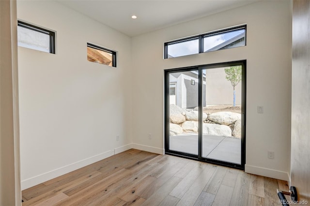 420 E Arkansas St, Buena Vista, CO 81211 - empty room featuring light wood finished floors, baseboards, and recessed lighting