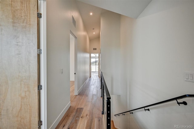 420 E Arkansas St, Buena Vista, CO 81211 - hall with lofted ceiling, light wood finished floors, baseboards, and recessed lighting