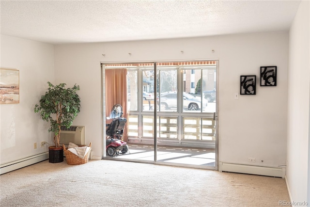 entryway featuring a textured ceiling, an AC wall unit, baseboard heating, and carpet