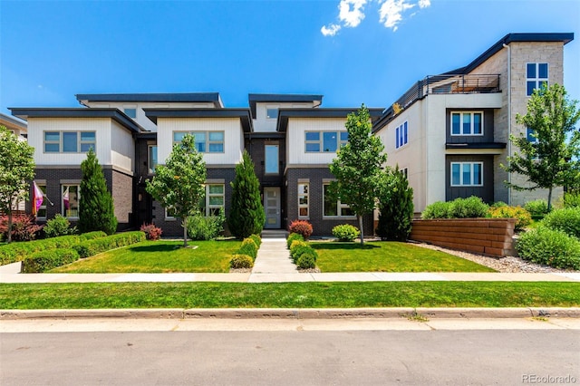 3586 S Ogden St, Englewood, CO 80113 - view of front of property featuring a front lawn