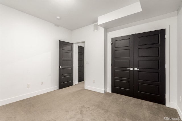 3586 S Ogden St, Englewood, CO 80113 - unfurnished bedroom with light carpet and a closet