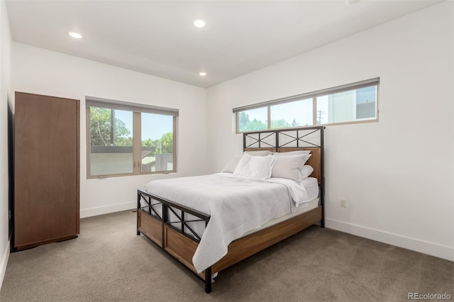 3586 S Ogden St, Englewood, CO 80113 - carpeted bedroom with multiple windows and recessed lighting