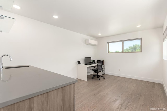 3586 S Ogden St, Englewood, CO 80113 - unfurnished office featuring a wall unit AC, light wood finished floors, and recessed lighting