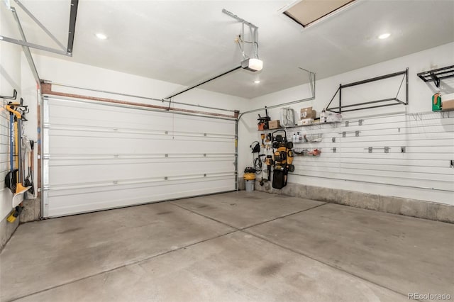 3586 S Ogden St, Englewood, CO 80113 - garage with recessed lighting and a garage door opener