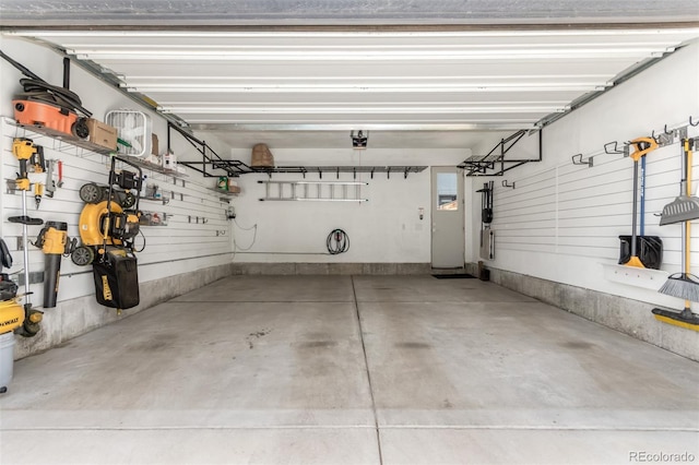 3586 S Ogden St, Englewood, CO 80113 - garage featuring a garage door opener